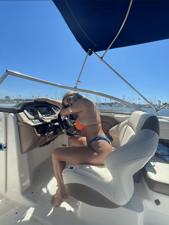 Lexi Silverstein drives a boat
