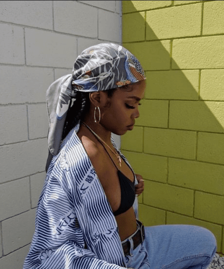 A woman wearing a bandana