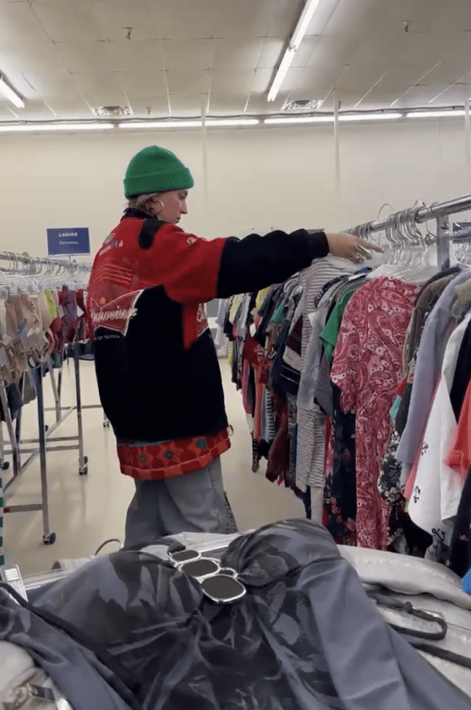 Looking through the thrifting rack