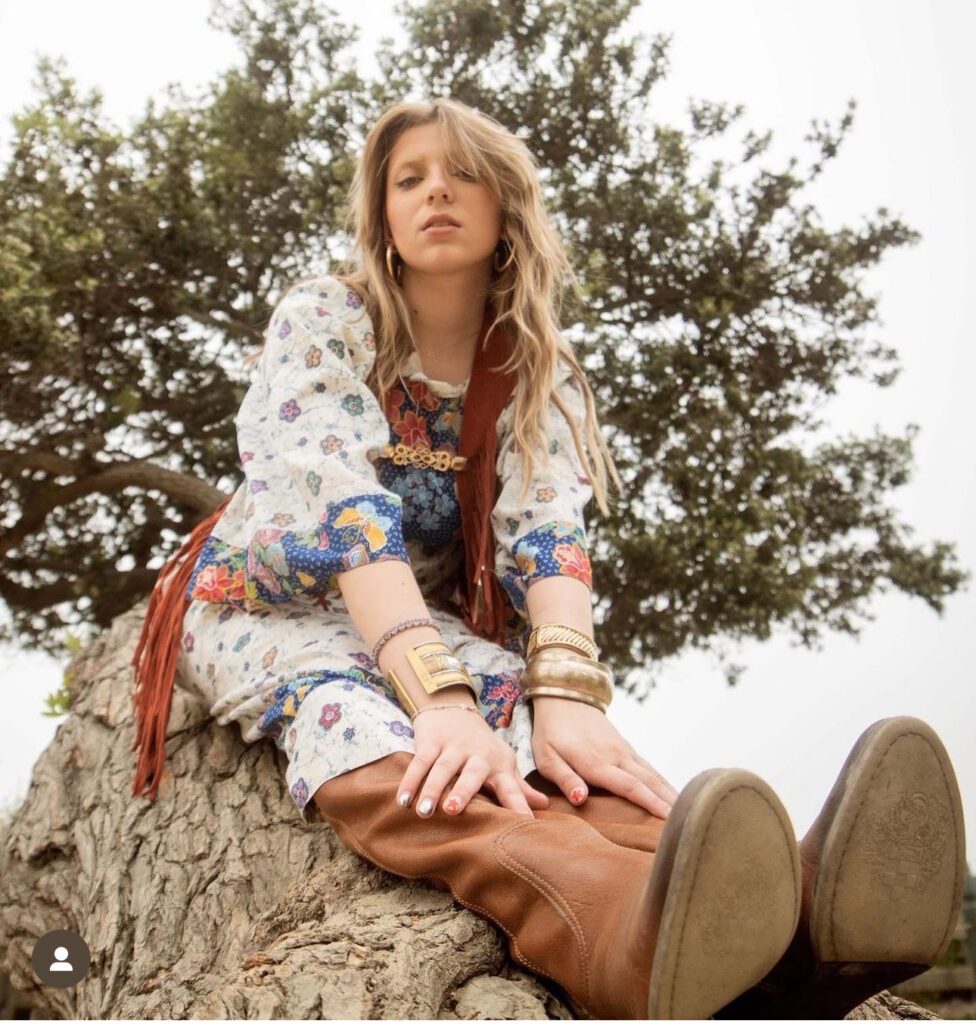 Lexy Silverstein as a 1970s flower child for Halloween