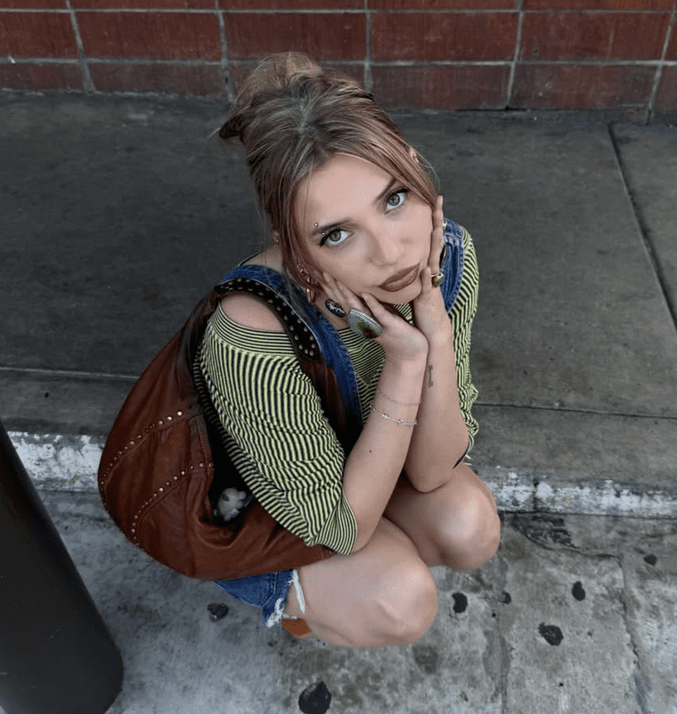 Lexy Silverstein in a Sustainable Outfit from Goodwilll, Thrifted purse from Los Feliz Flea Market 
